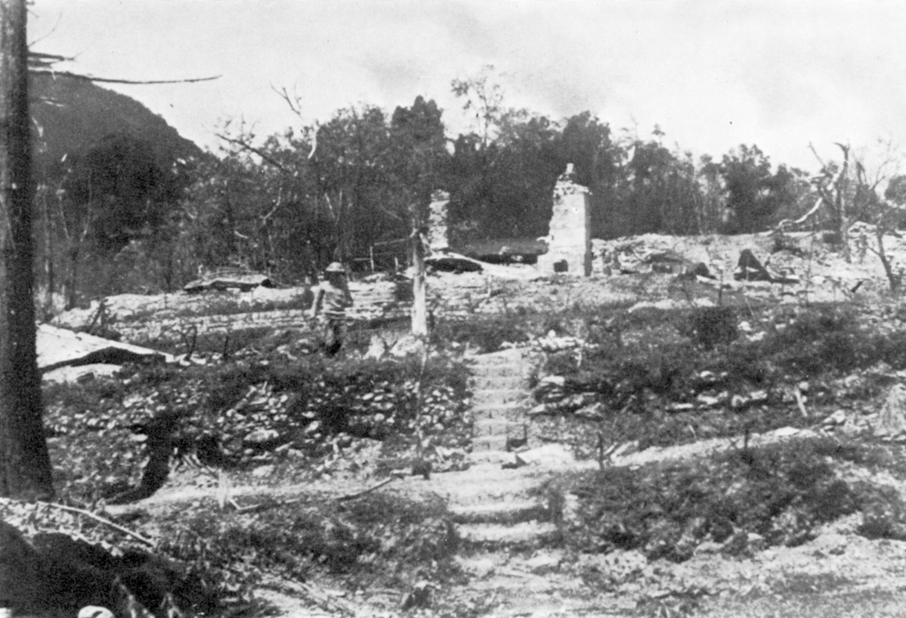 The ruins of the district commissioner’s bungalow at Kohima bear mute testimony to the savagery of the fighting. Combat took place in such close quarters that bitter fighting raged over 
control of a tactically vital tennis court. 