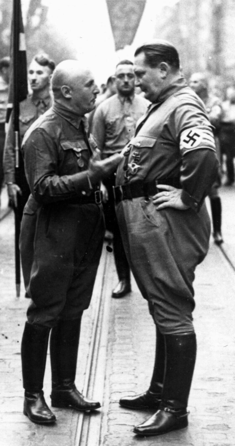 Prior to a commemoration of the failed Munich Beer Hall Putsch, Julius Streicher confers with fellow Nazi Hermann Göring, chief of the Luftwaffe, on November 9, 1937. (Library of Congress)