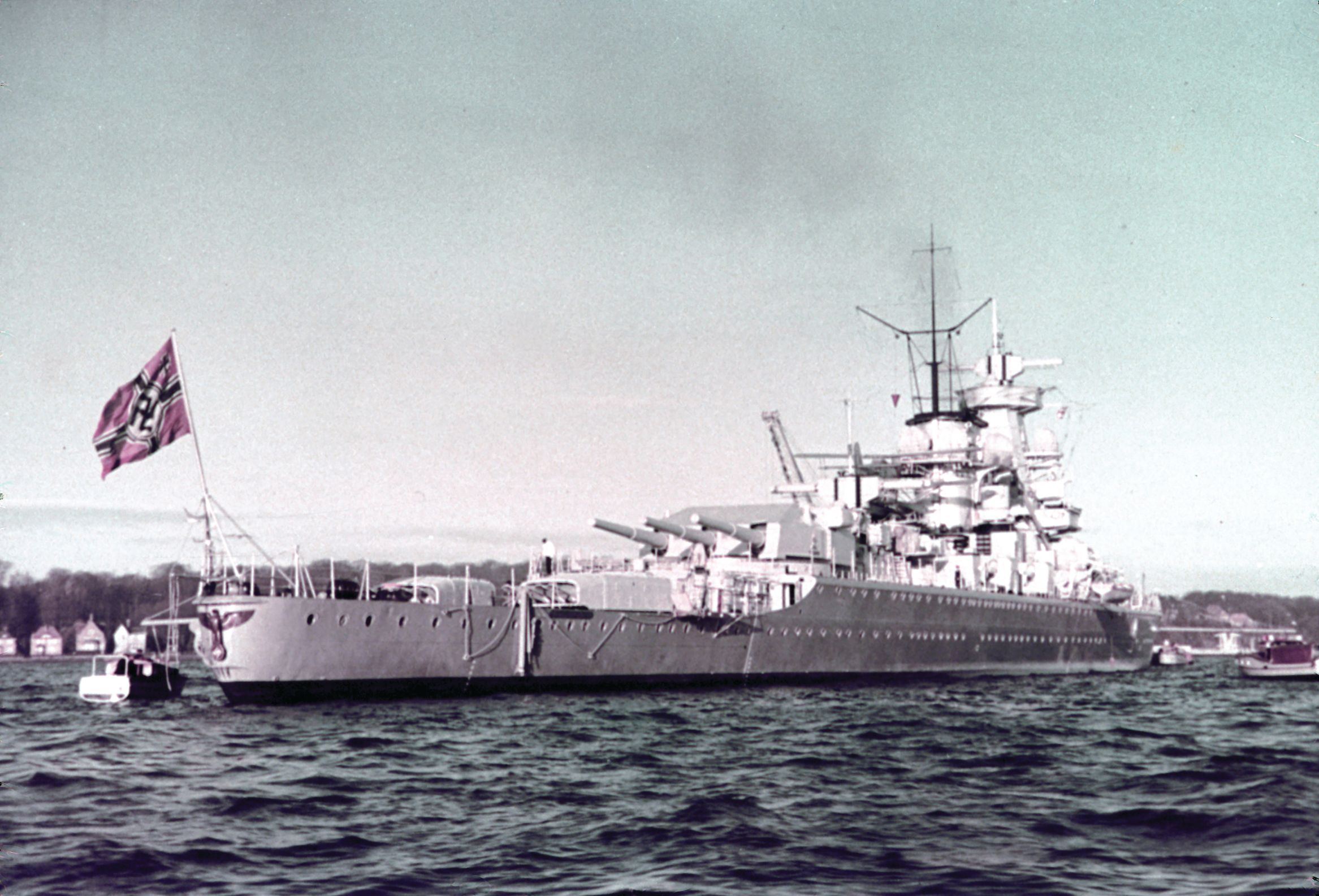 The pocket battleship Admiral Scheer is photographed at anchor in 1938. The warship was built for speed and with heavy armament, its main battery including 11-inch guns. Admiral Scheer’s attack on Convoy HGX84 was disappointing as most of the merchant ships escaped due to the vigorous defense of its escorts.