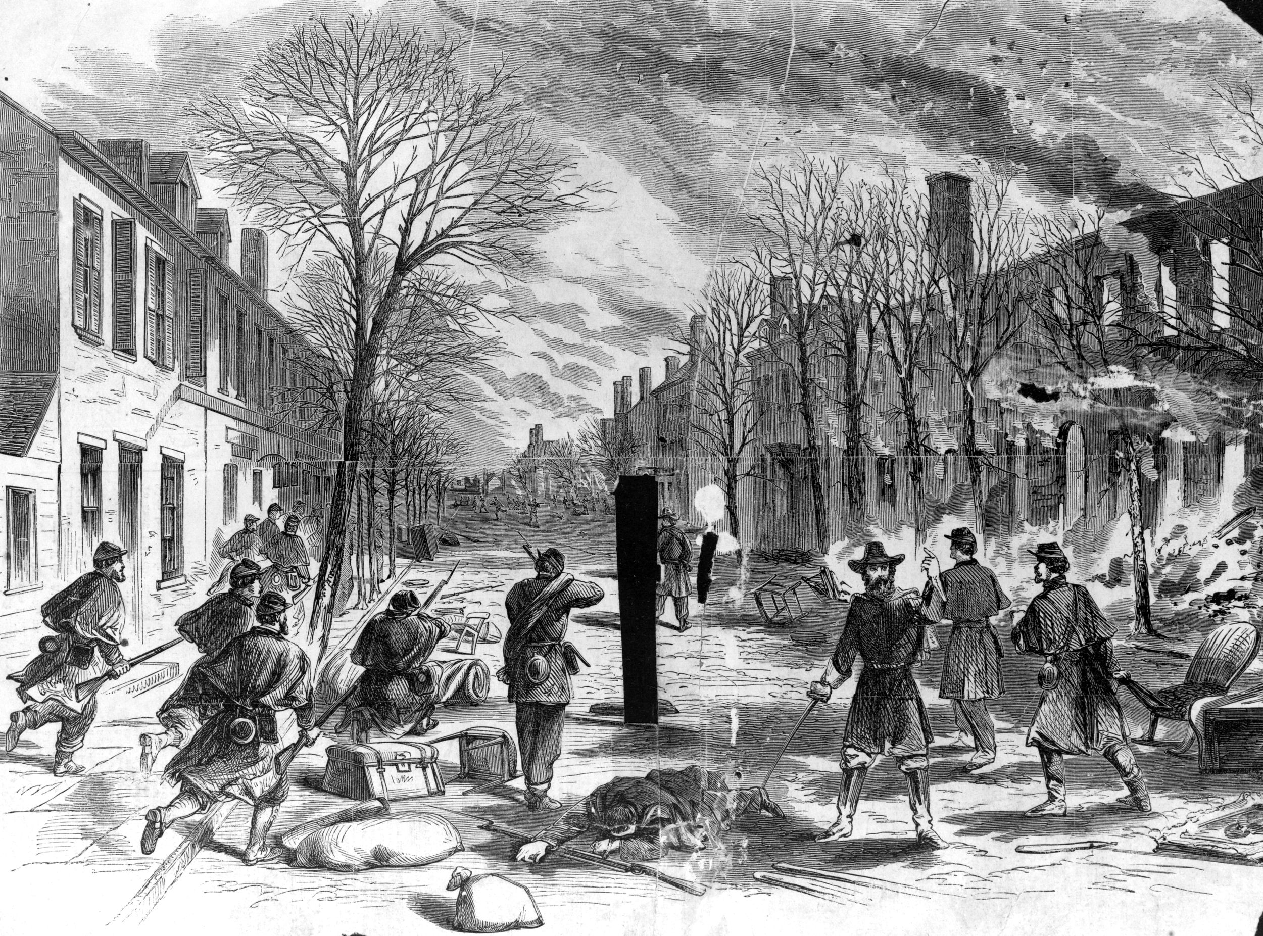 Federal soldiers advance under fire through the rubble-strewn streets of Fredericksburg during the initial phase of the two-day battle.