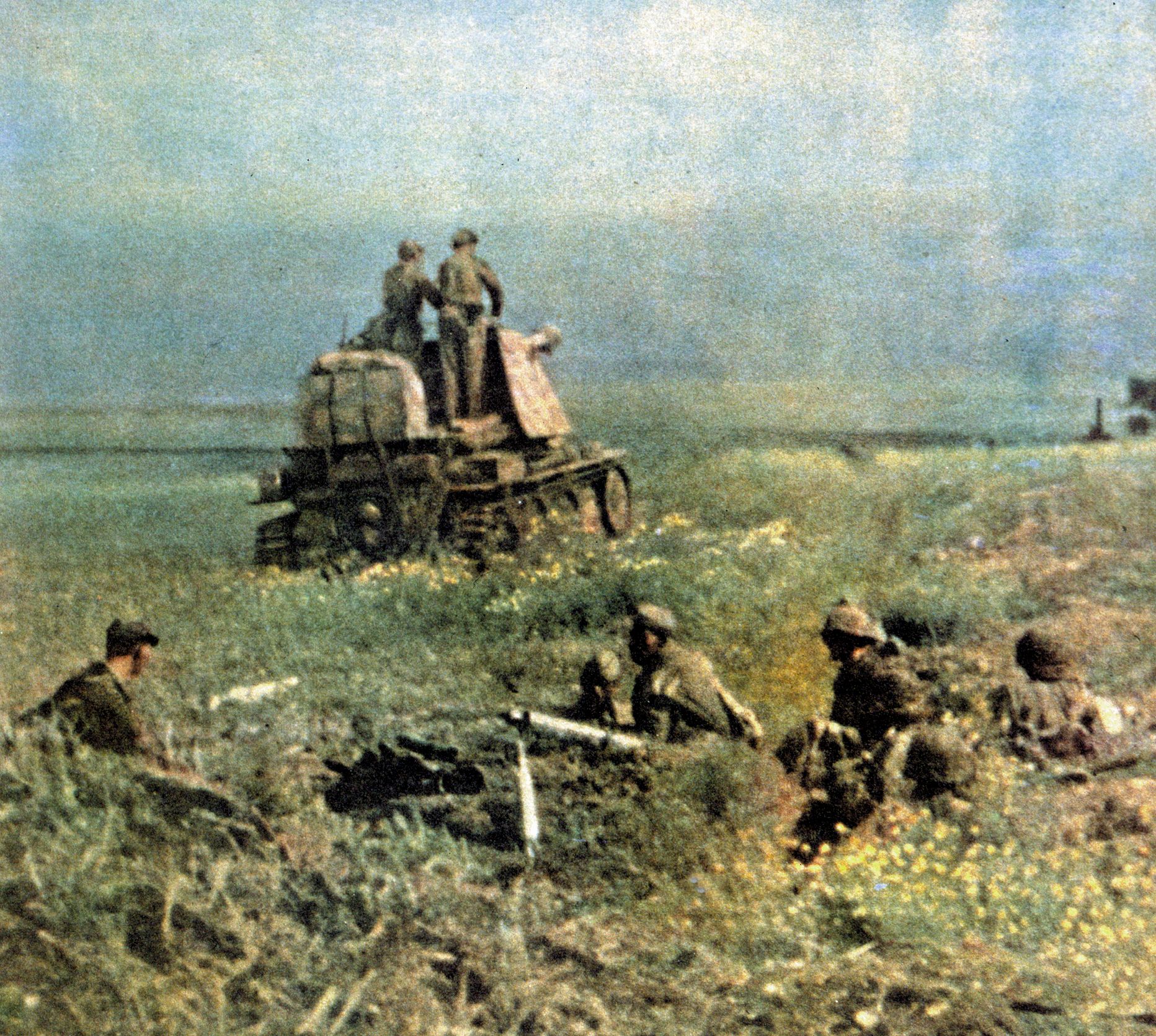 In an attempt to beat back a Red Army breakthrough near Belgorod, German artillery fires at the Soviet spearhead. In the foreground, a Waffen SS grenadier keeps watch over Soviet prisoners. 