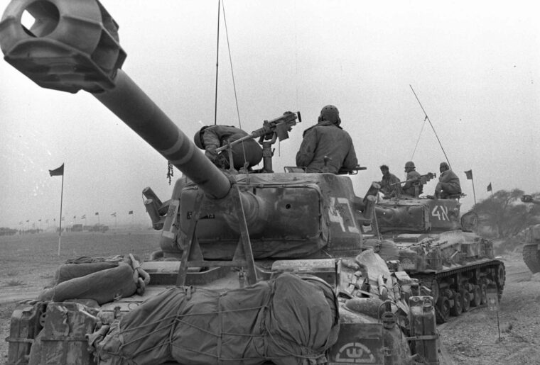 Israeli soldiers operate Super Sherman tanks during winter maneuvers in the Negev Desert, January 3, 1967. The tanks would soon prove their worth in combat.