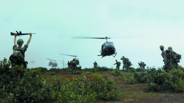 Hueys prepare to pick up members of Company A, 5th Battalion, 7th Cavalry to airlift them to a reported enemy ammunition dump in Thang Binh province, 24 miles north of Chu Lai, Jan. 17, 1968.