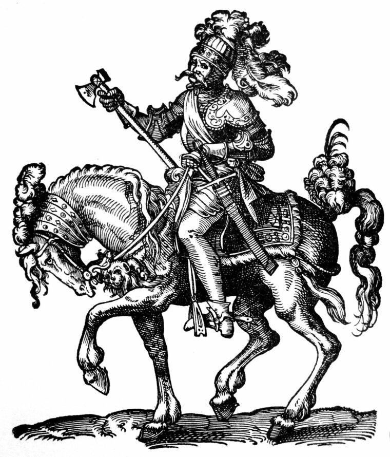 A 16th-century Polish hussar armed with a czekan war hammer, which had an opposing axe head.