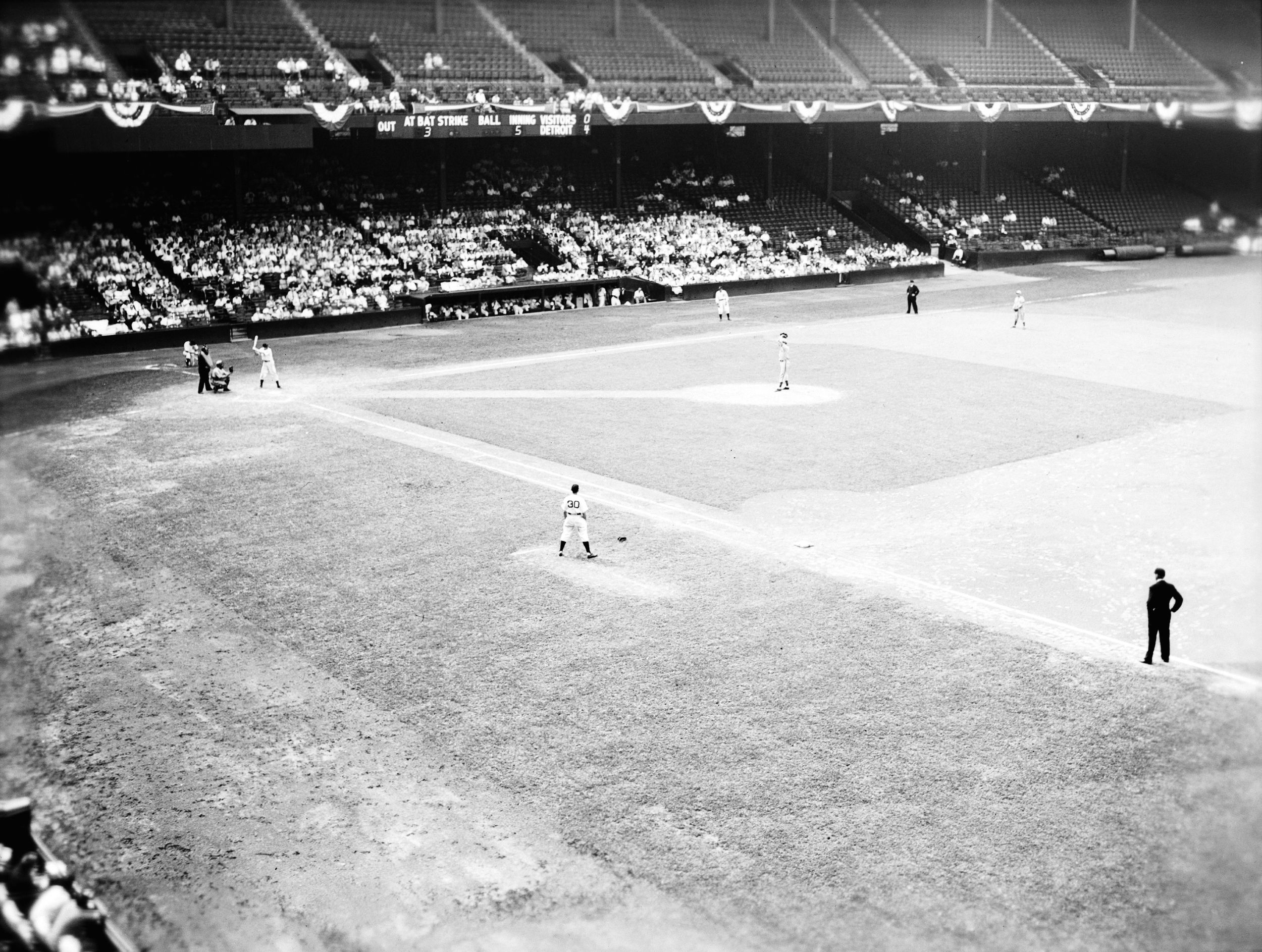 Fans crowd the stadium for a game between the Detroit Tigers and the Cleveland Indians in 1942. President Franklin D. Roosevelt asserted that continuing to play major league baseball was essential to the national morale.