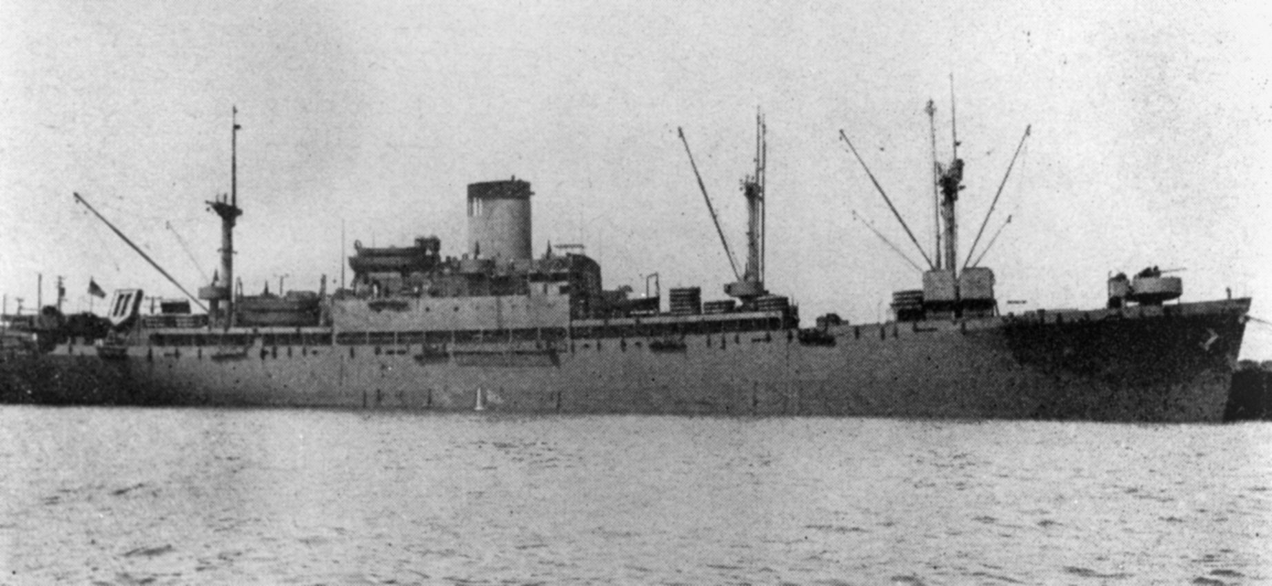 Shown while in port in 1943, the troopship SS Cape San Juan was to later meet a tragic fate, torpedoed by a Japanese submarine.  Survivors of the sinking were rescued after a harrowing ordeal.