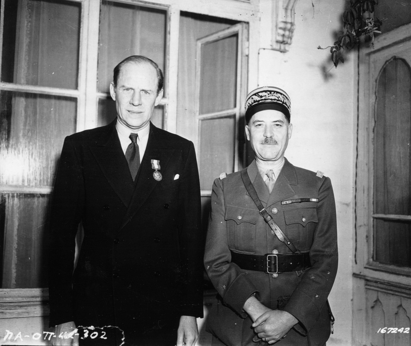 Robert Murphy, American minister to French North Africa, recruited French Army officers to aid the Allied cause. He is pictured with General Alphonse Juin, appointed commander of French forces in North Africa by the Vichy government. He changed sides after the Allied invasion.