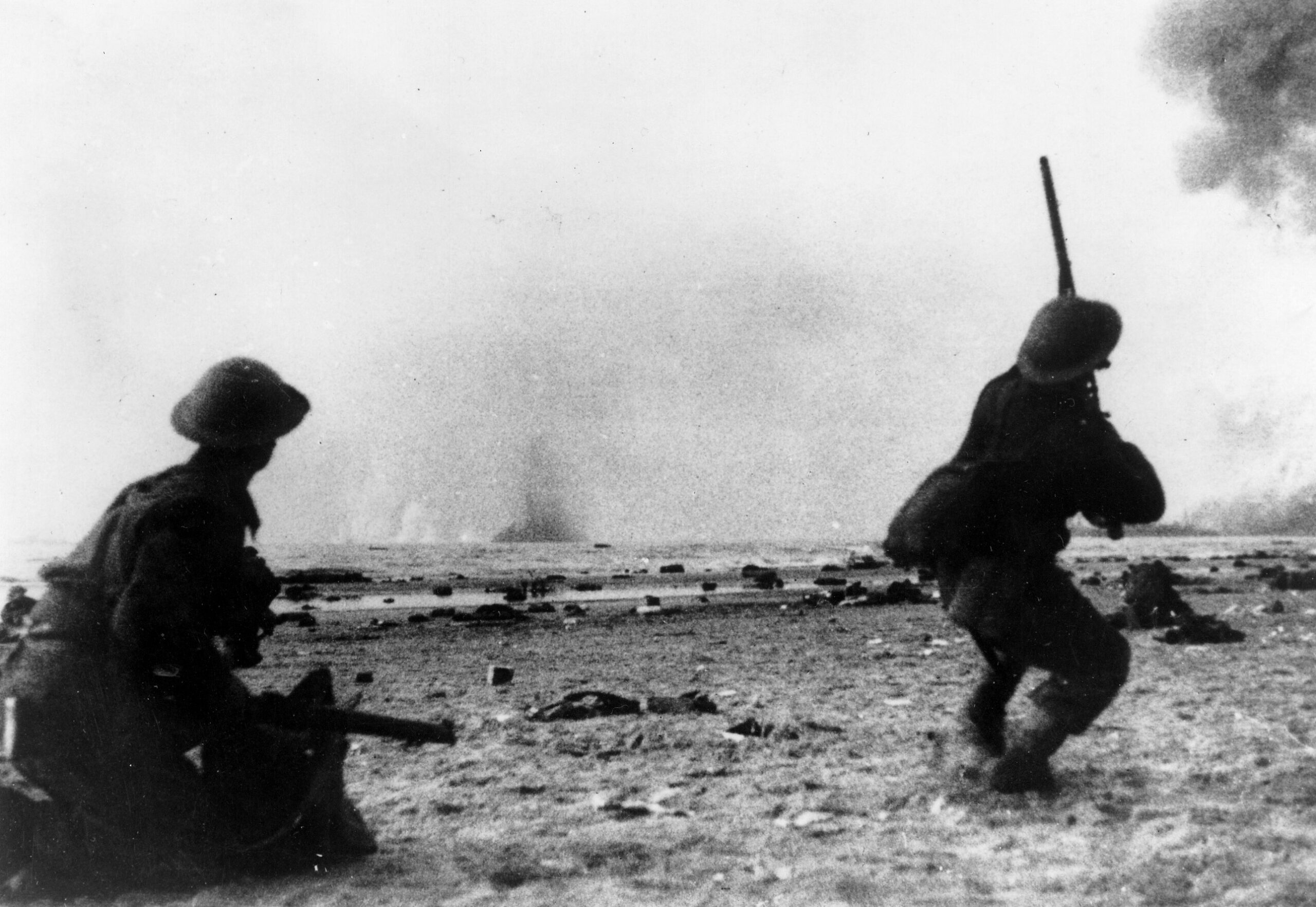 On the beach at Dunkirk, a British soldier takes a pot shot at a low-flying German plane. The Luftwaffe attacked the British at Dunkirk incessantly, but failed to ever deliver a knockout blow. 