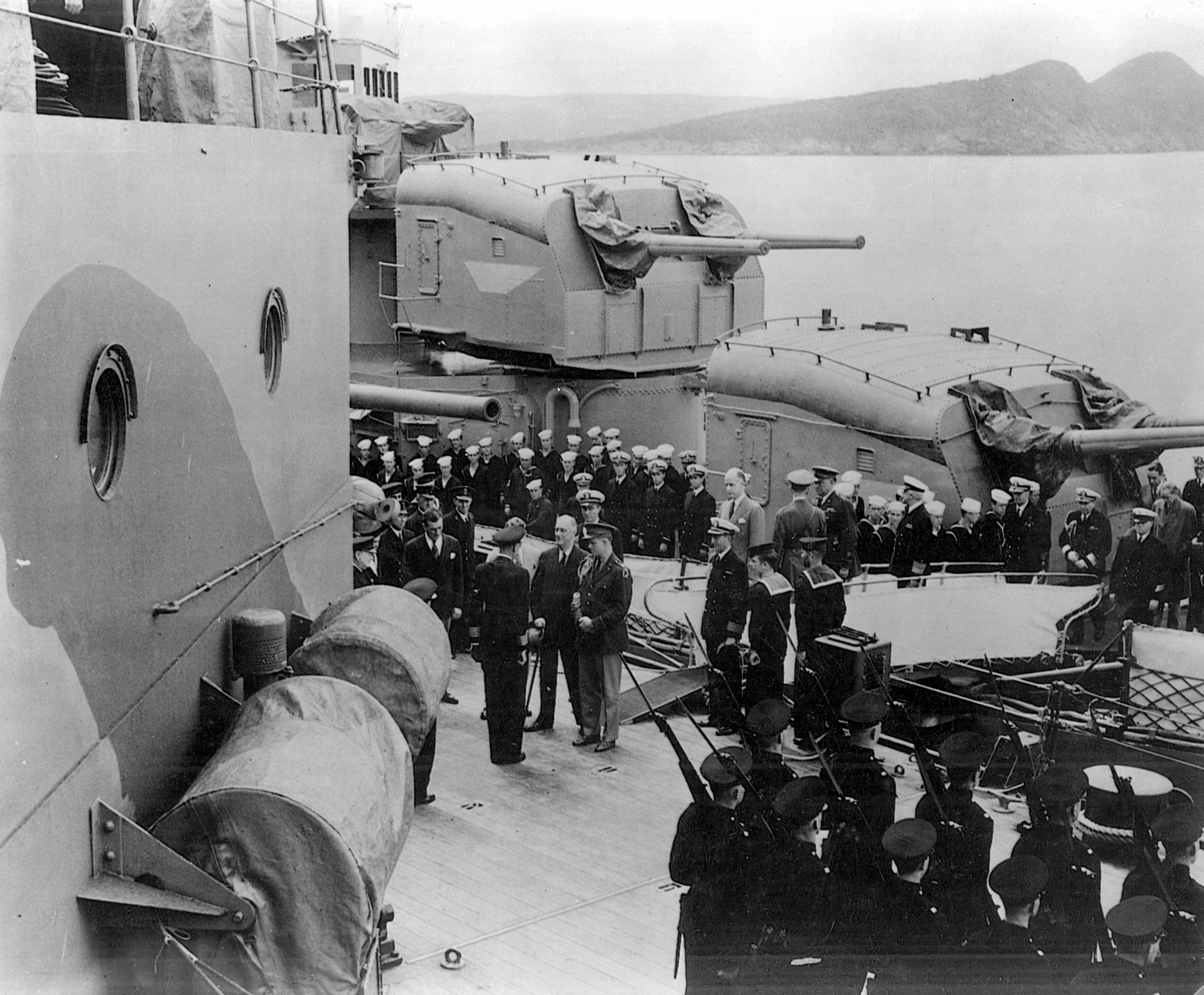 Arriving aboard the battleship HMS Prince of Wales, President Franklin D. Roosevelt is set to begin the historic Argentia Conference with British Prime Minister Winston Churchill.