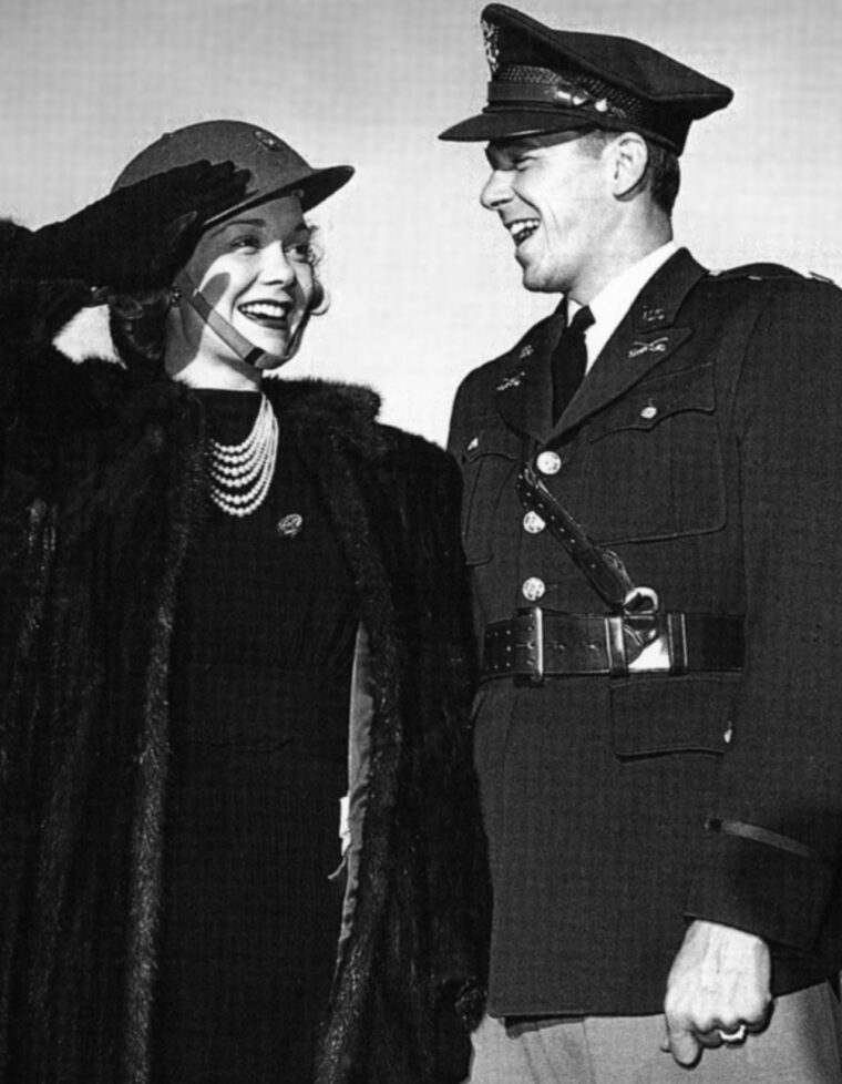 Jane Wyman salutes 2nd Lt. Ronald Reagan of the U.S. Army Air Corps.