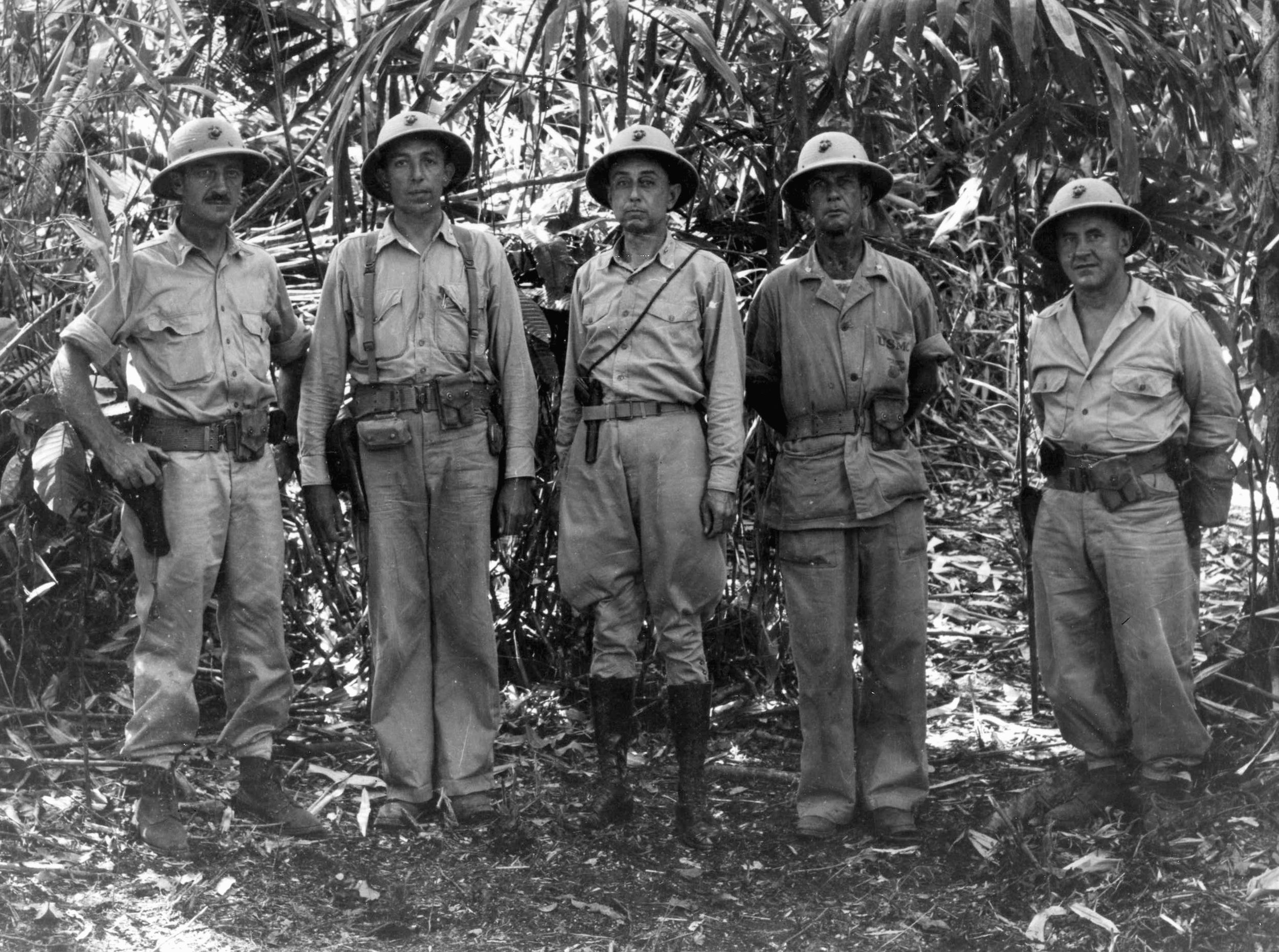 Senior officers of the 1st Marine Division, which fought heroically at Guadalcanal, included (left to right), Lieutenant Colonel L.B. Cresswell, Lieutenant Colonel Pollock, Colonel Clifton B. Cates, Lieutenant Colonel William N. McKelvy, and Lieutenant Colonel William W. Stickney.