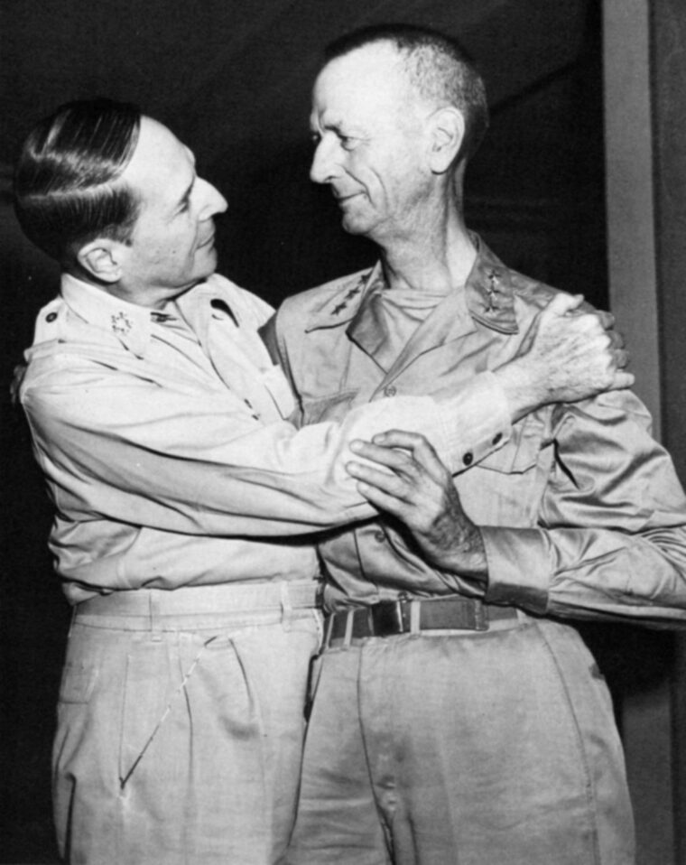 General Douglas MacArthur (left) embraces General Jonathan Wainwright after Wainwright’s return from a POW camp in Manchuria.