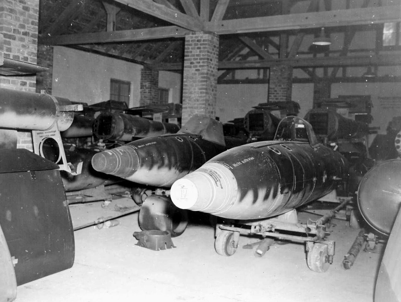 Bombs awaiting shipment to launching sites were found in sheds at the V-bomb assembly plant.