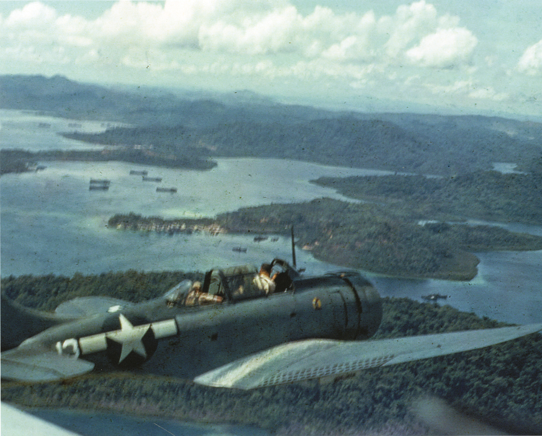 A U.S. SBD Dauntless dive-bomber cruises over the Solomons. The Dauntless wreaked havoc on Japanese shipping and contributed heavily to turning the tide in the Pacific.