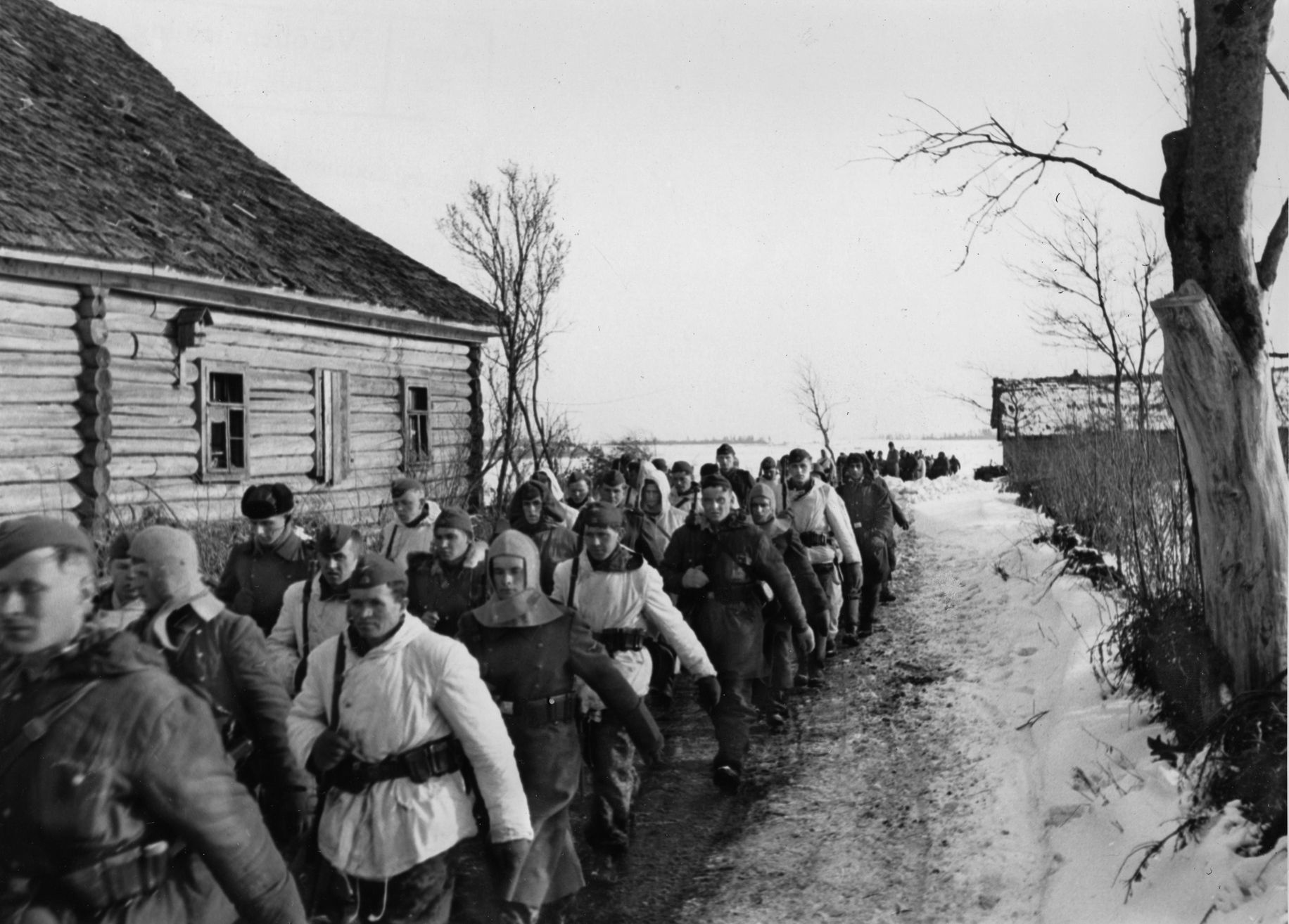 On the move in March 1944, a column of soldiers of the 14th Waffen Grenadier Division of the SS advances somewhere in the Ukraine. The division was originally populated with Ukrainian men and later augmented with other non-German troops.
