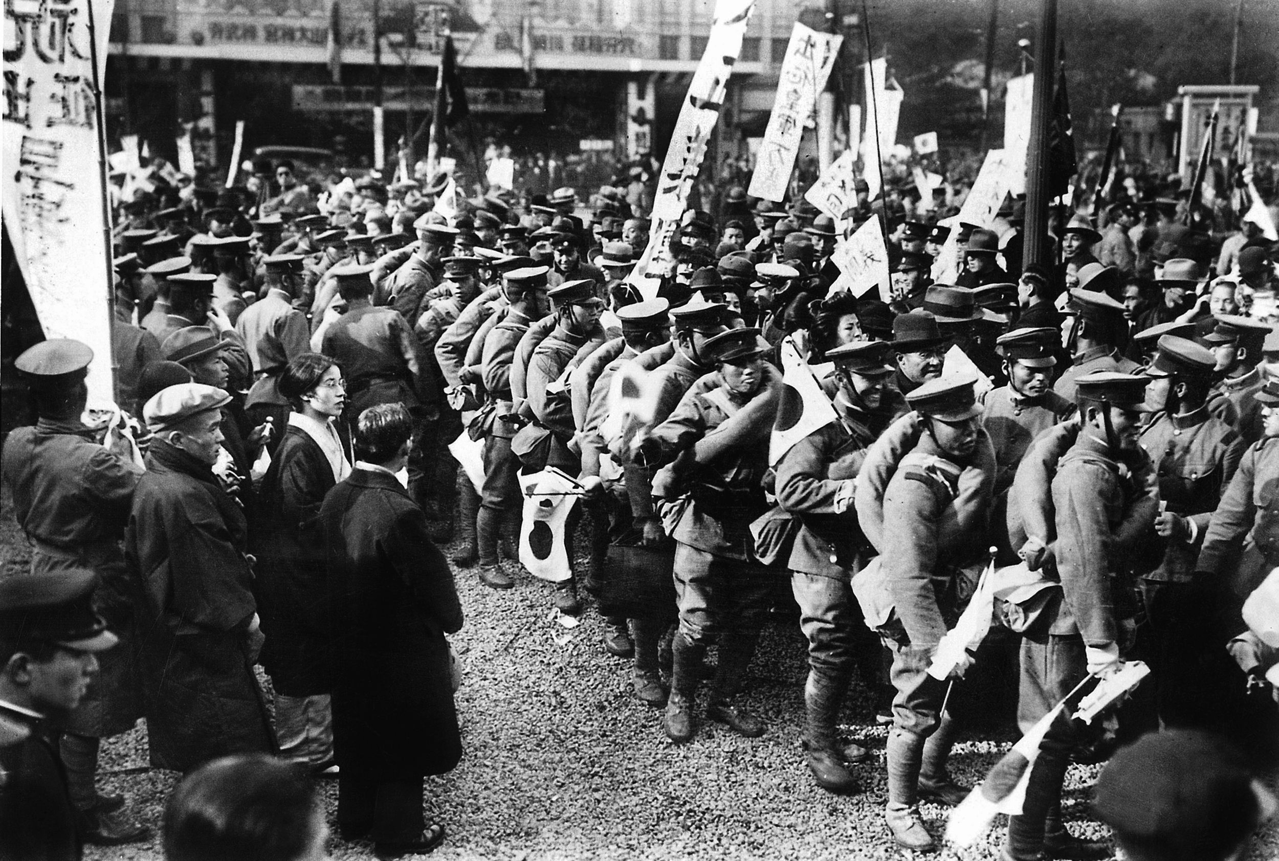 Japanese reinforcements depart for the Manchurian front following the Russian invasion, which came several months before expected.