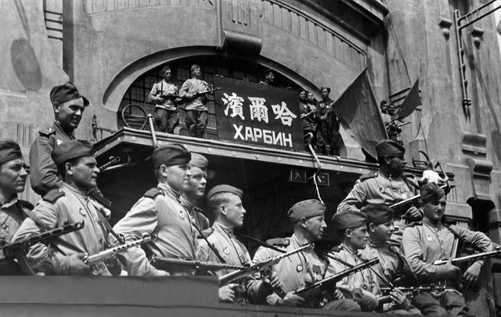 Swaggering Soviet troops liberate Harbin, Manchuria. The Soviets treated Chinese civilians brutally.