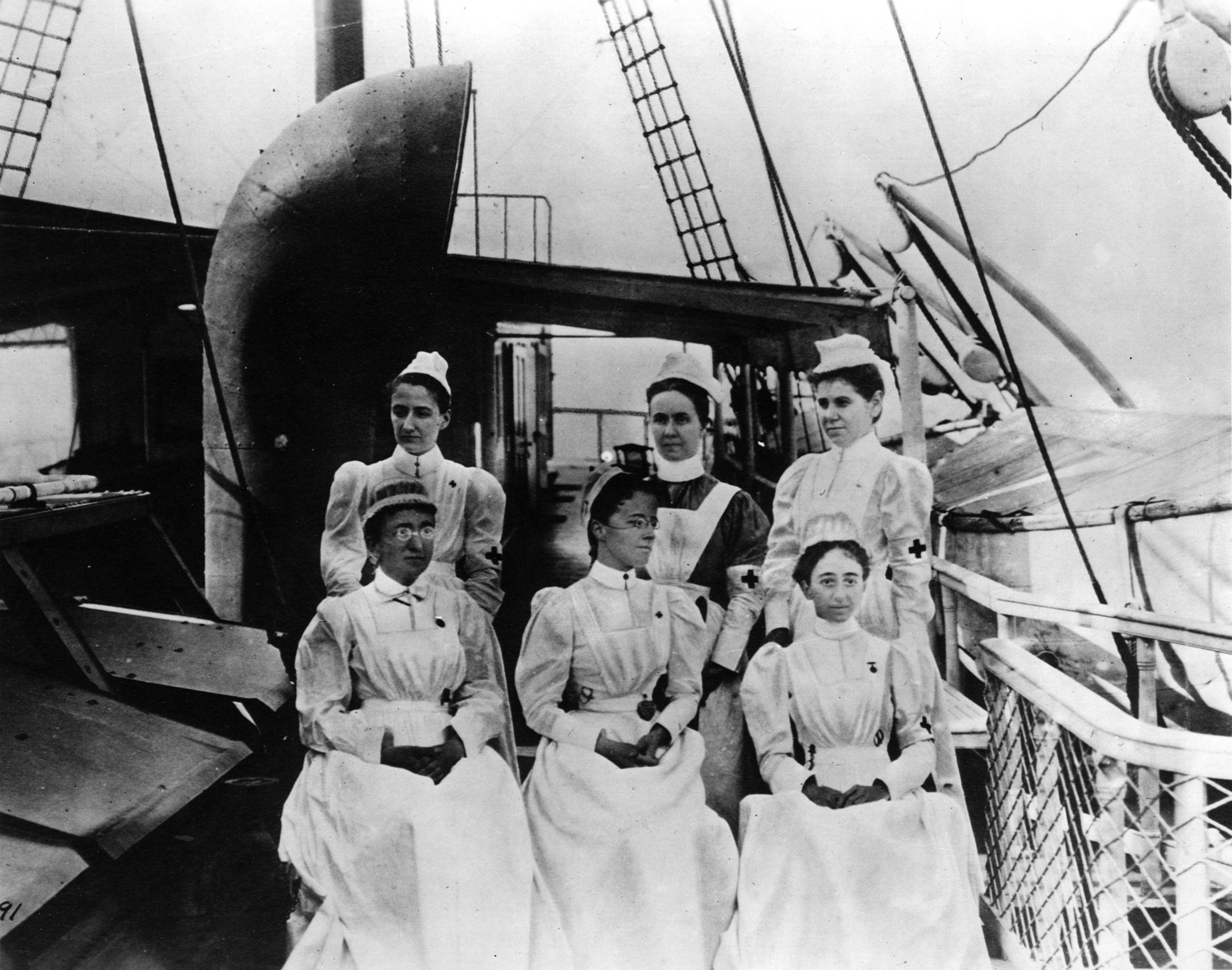 Nurses on board a hospital ship await the next batch of wounded. 