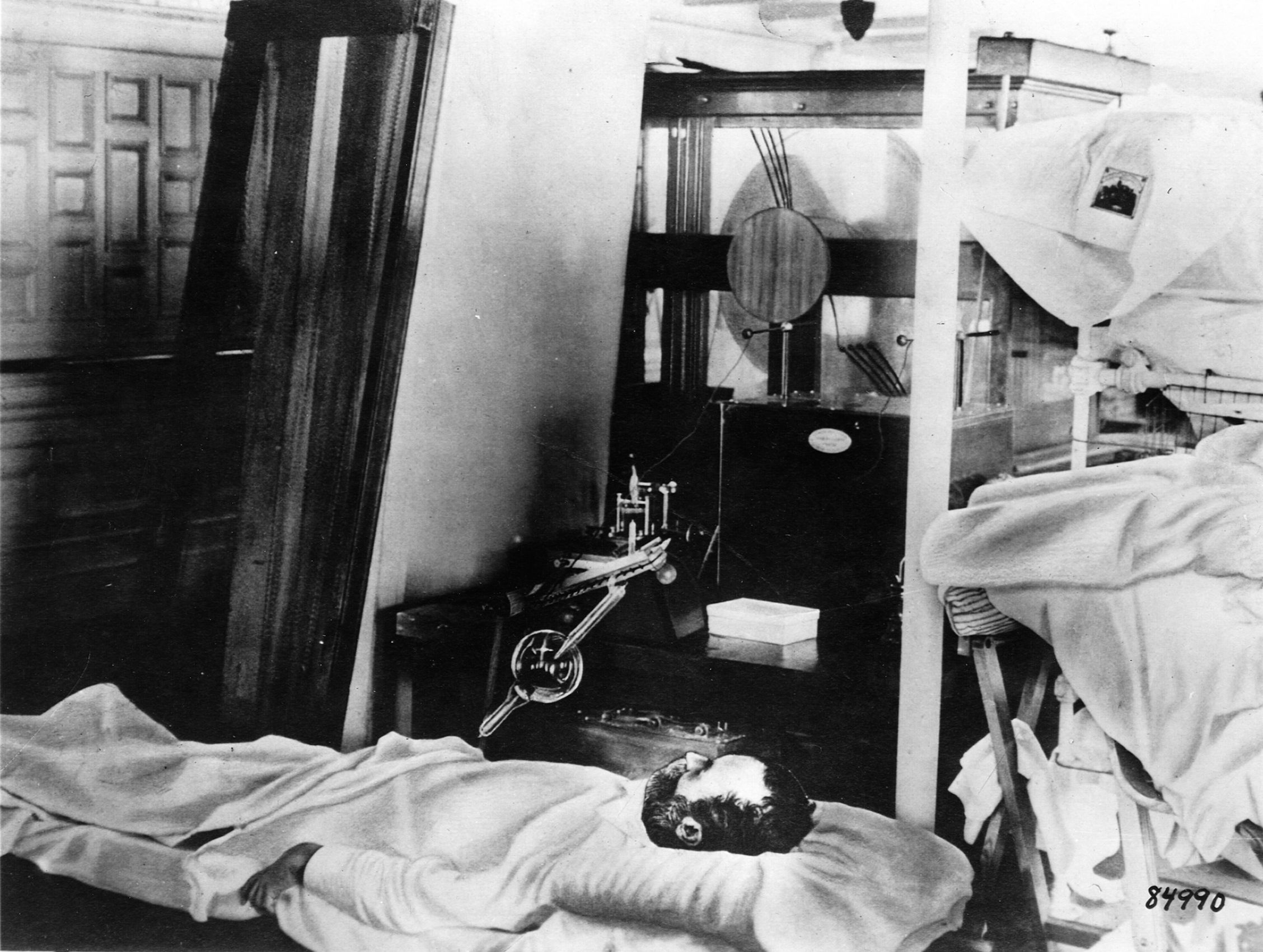 A doctor takes an X-ray photo on the hospital ship Relief off the coast of Siboney.