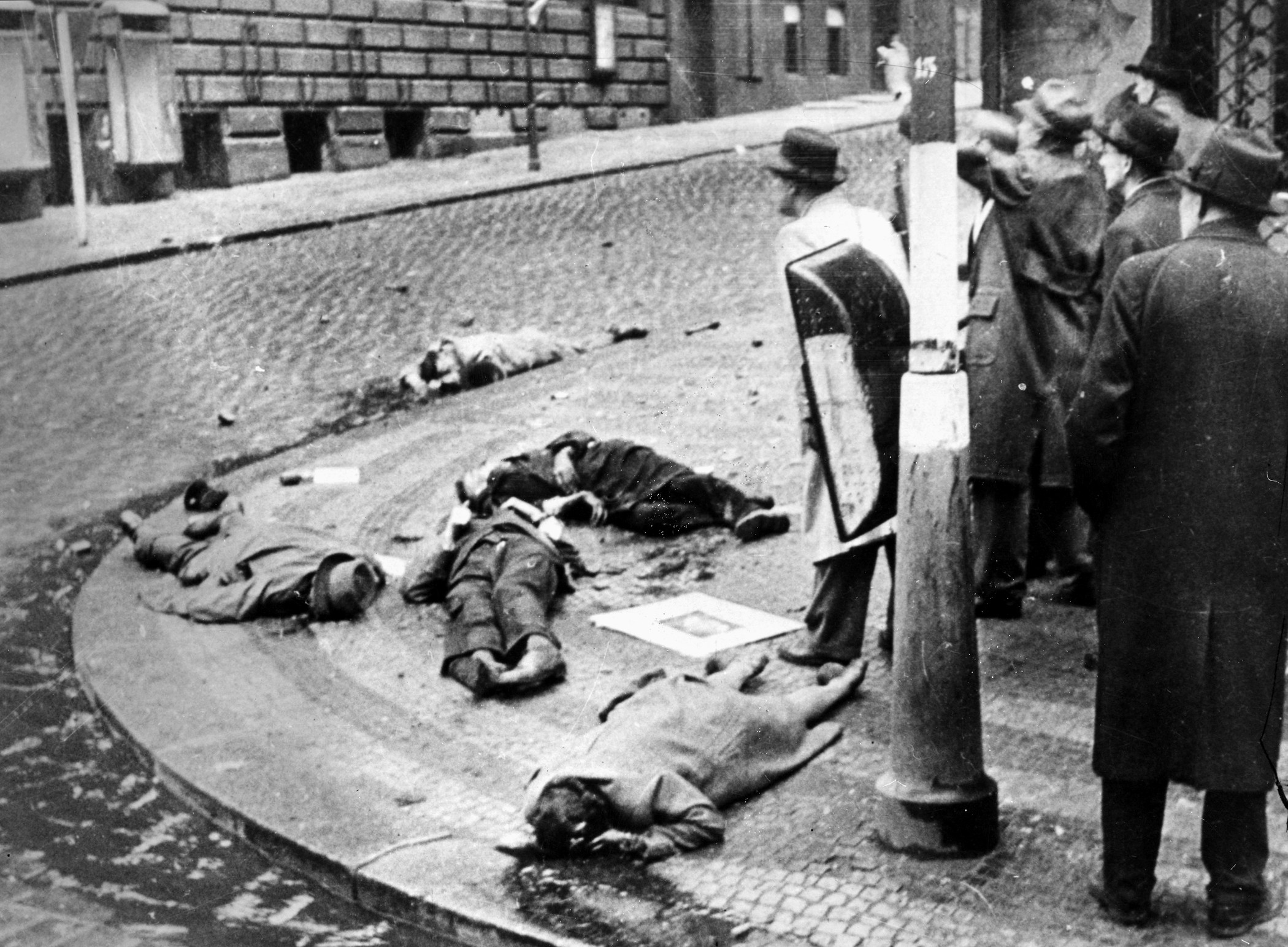 The bodies of members of the Czech Resistance lie sprawled on a Prague street corner following the uprising.