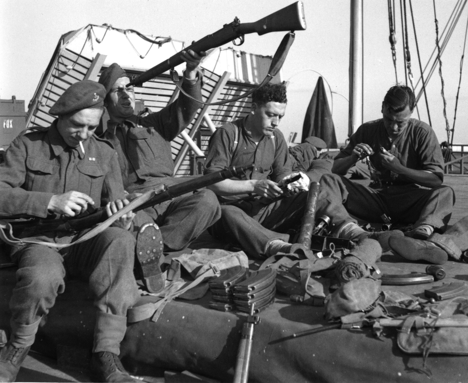 Preparing for their D-Day embarkation, soldiers of the 6th and 7th Battalions, Green Howards, check their equipment, sort through their kits, and make final preparations to land on Sword Beach.