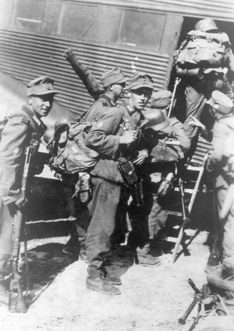 Loaded with equipment, German mountain troops, or gebirgsjager, clamber aboard a Ju-52 transport aircraft in preparation for the assault on Crete. Although the Germans were victorious in the battle for the island, they paid a heavy price for their conquest.