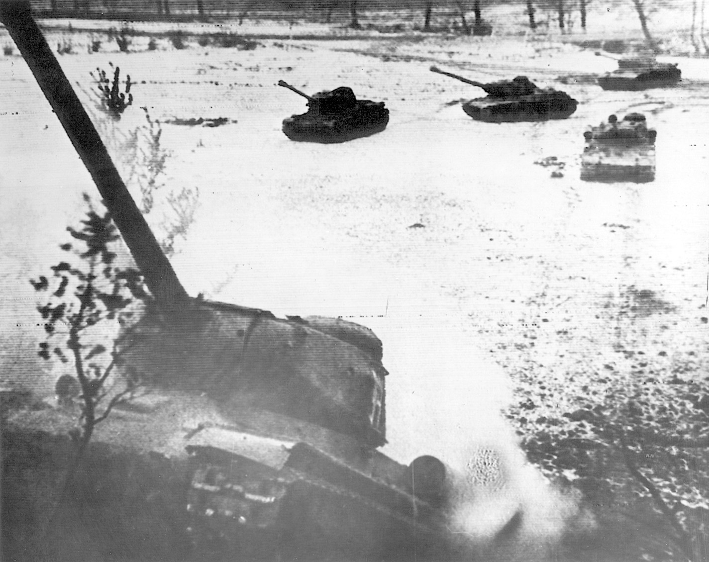 ABOVE: Heavy tanks of the Red Army advance across a snow-covered valley and up a hill in East Prussia on February 17, 1945. Within weeks, Soviet armor was in the streets of Berlin.