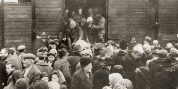 Hungarian Jews arrive at Auschwitz in May 1944. Healthy young people were sent to work in the factory, while the aged, sick, and children went to their deaths in the gas chambers.