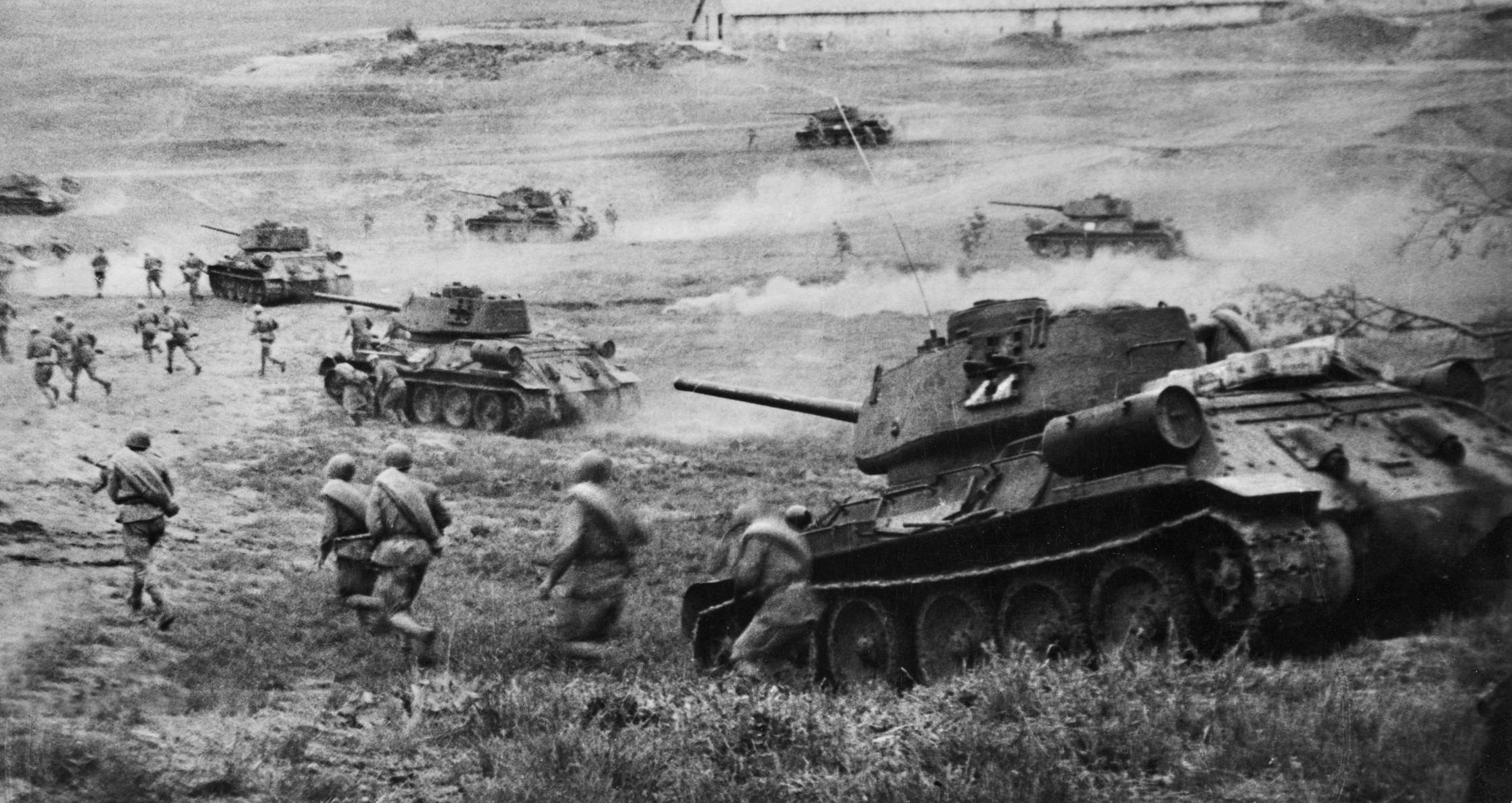 T-34 medium tanks and Red Army infantrymen attack across an open plain in the Ukraine. The T-34 proved to be one of the most outstanding armored vehicles of World War II and spearheaded the Soviet advance into the Third Reich.