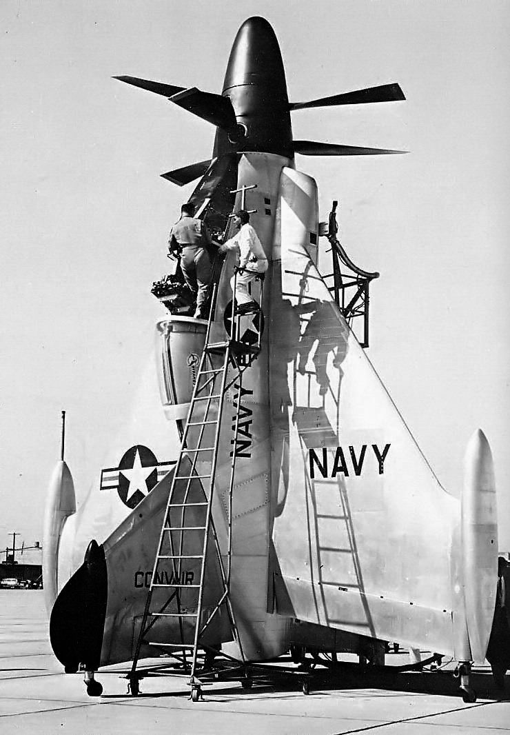 A Pogo test pilot climbs into the cockpit with some assistance from the ground crew prior to takeoff.