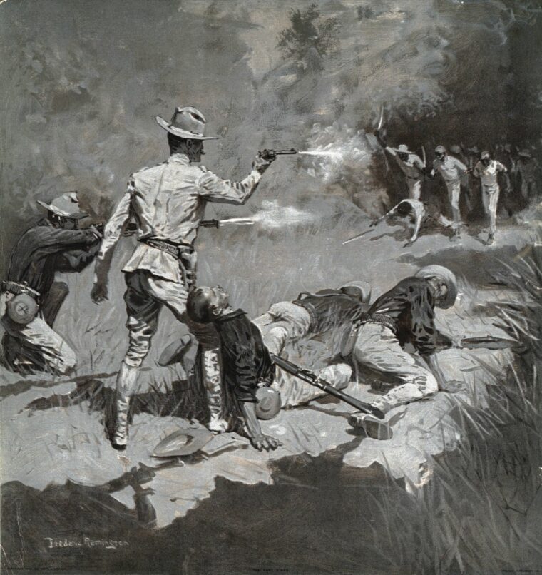 An American Army officer fires his Colt 1892 revolver at charging Filipino insurgents in this painting by Frederick Remington.