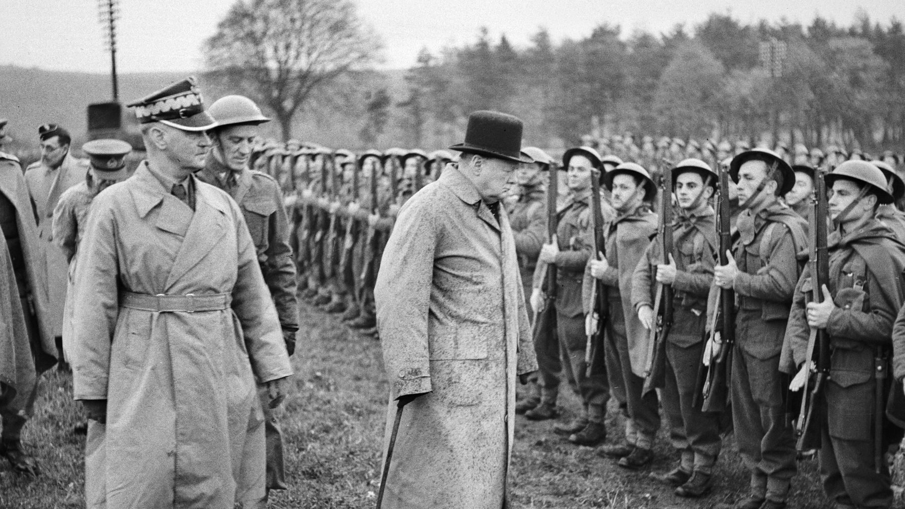 British Prime Minister Winston Churchill inspects Polish troops at Tentsmuir, Scotland, in October 1940. To Churchill’s right is Polish leader in exile Wladyslaw Sikorski.