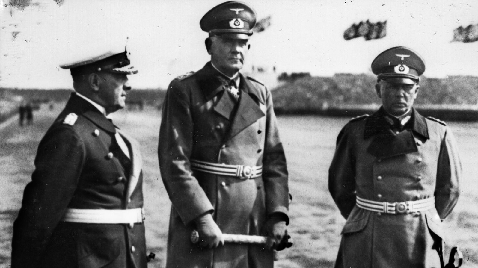 Grand Admiral Erich Raeder of the German Navy (left), Reich Minister of War Werner von Blomberg (center), and Army Chief Werner von Fritsch confer informally days before the secret meeting that reportedly spawned the Hossbach Memorandum.