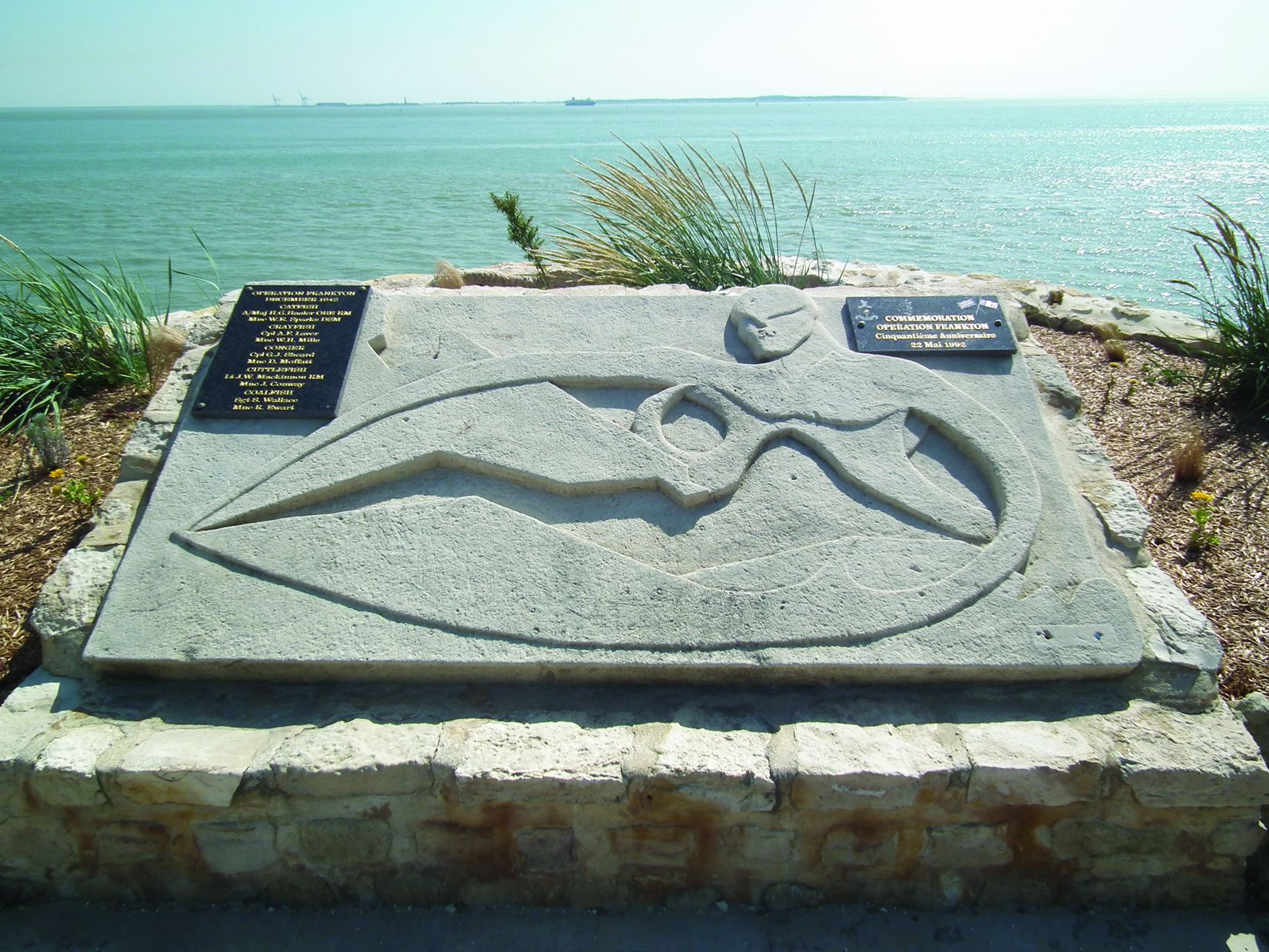 A stone tablet erected near the harbor at Bordeaux, France, commemorates the valor of the British Cockleshell Heroes.