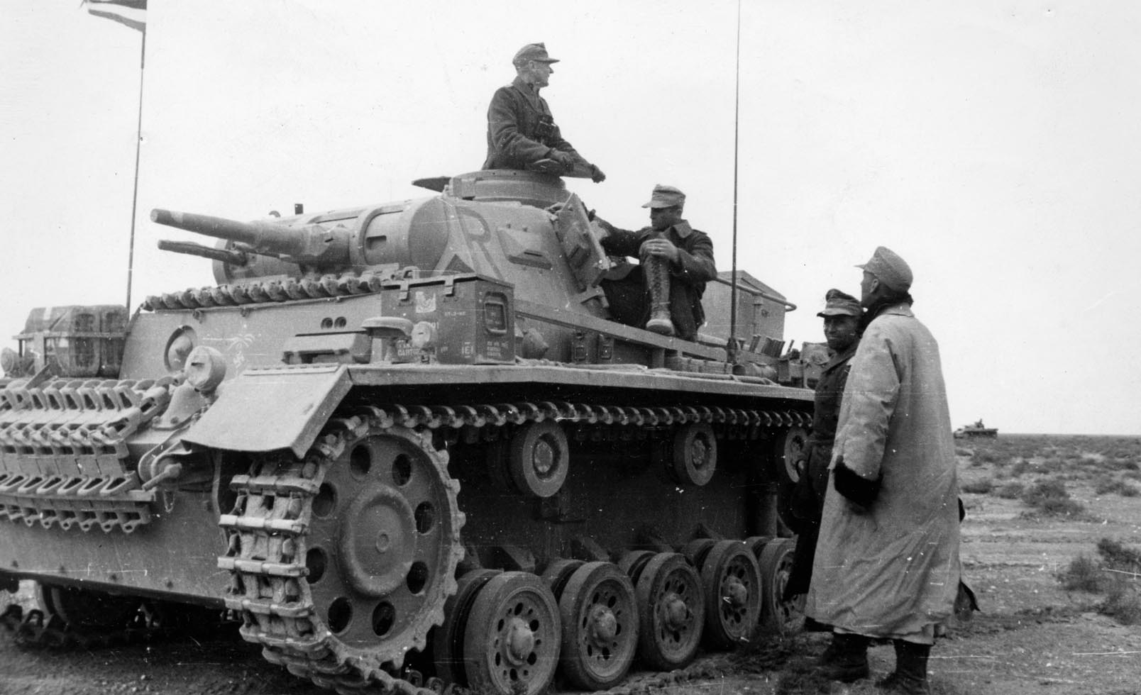 German panzer troops confer during a lull in the fighting. Rommel was forced to break off his attack on September 2 because of the severity of allied air attacks and lack of fuel.