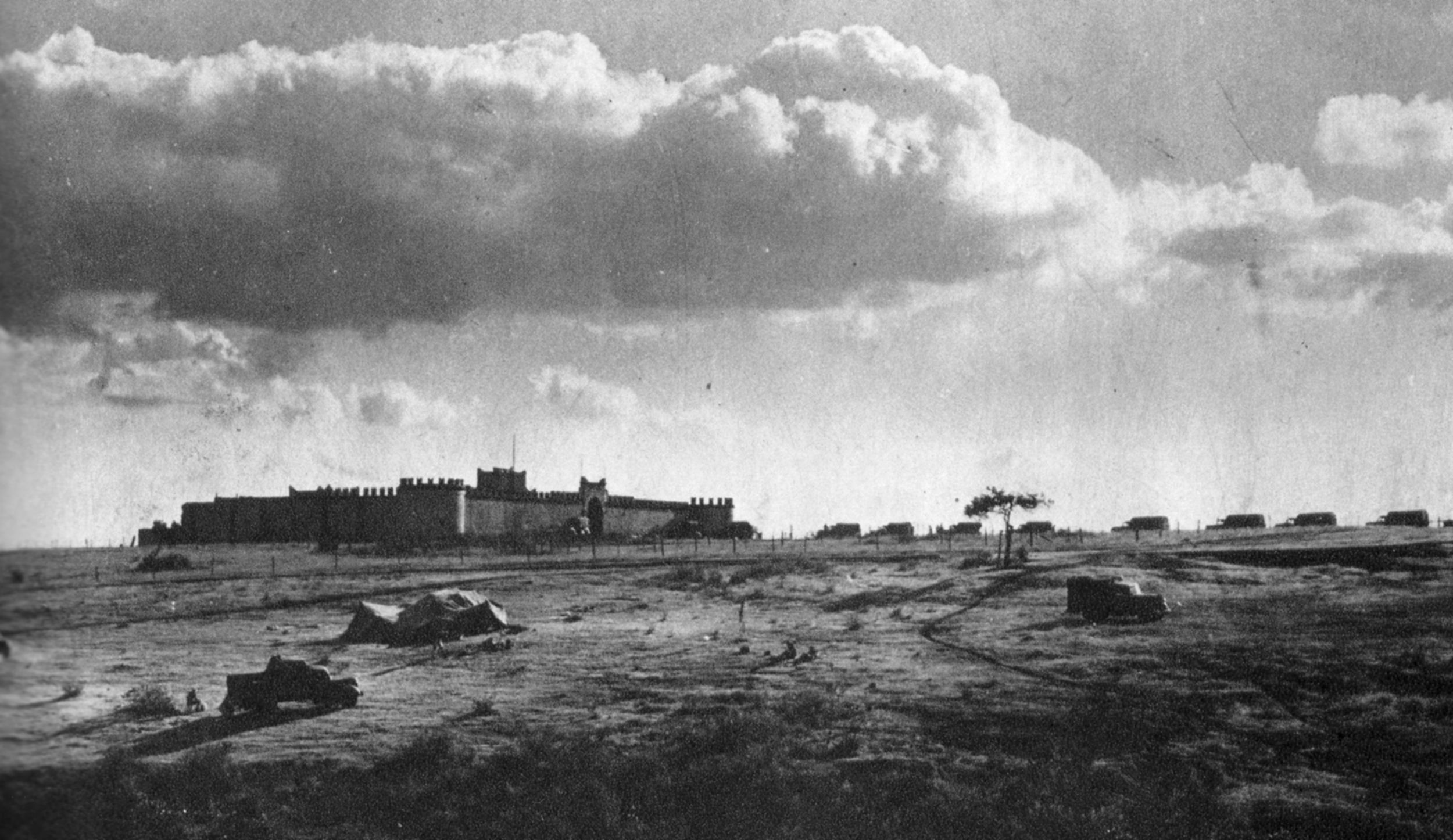 The Italian stronghold of Mega Fort in southern Ethiopia lies temporarily quiet prior to an attack by the South African 1st Division in 1941. Fascist Italy suffered a serious blow to its prestige with the loss of its East African holdings.