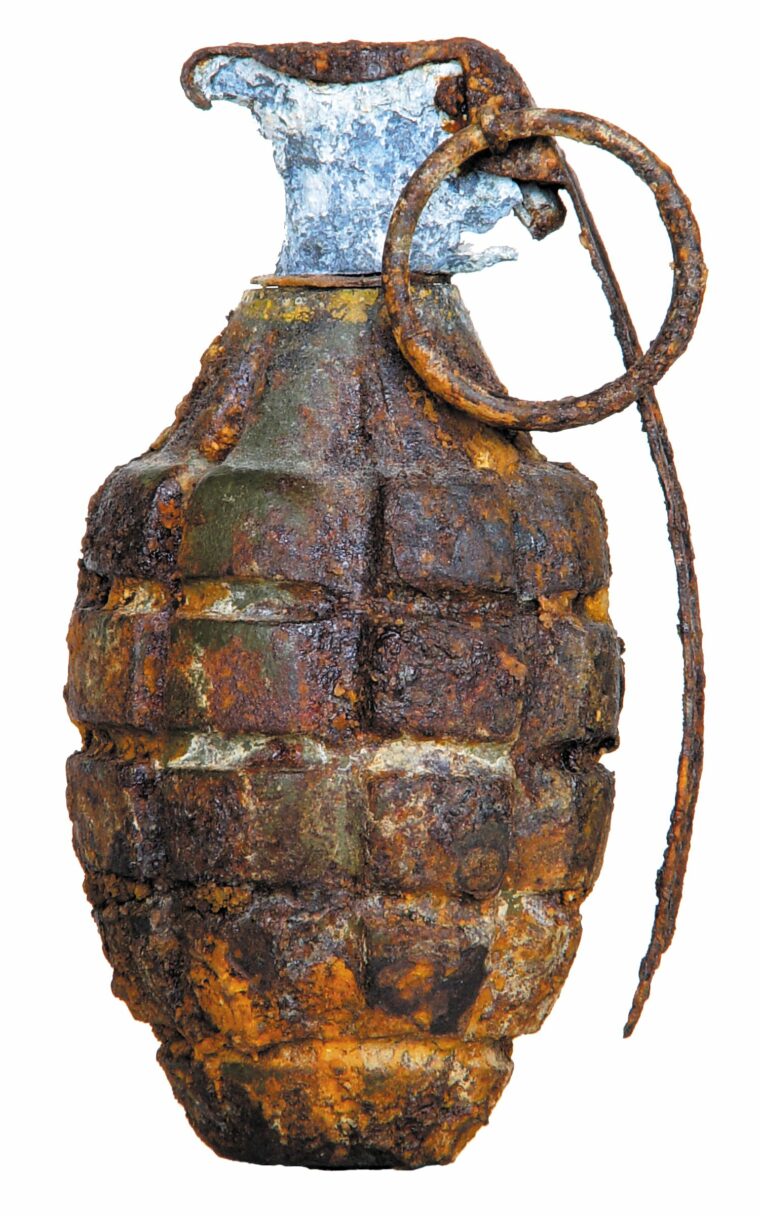 MKIIA1 hand grenade recovered in Company A area on July 4, 1996.