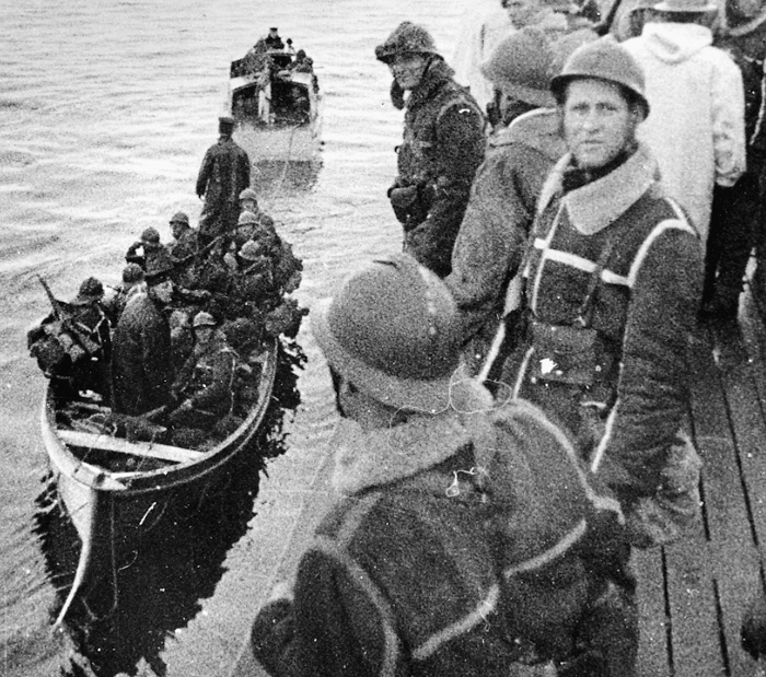 French soldiers take to small boats during operations to land ground troops at Bjervic while fighting raged in the vicinity of Narvik.