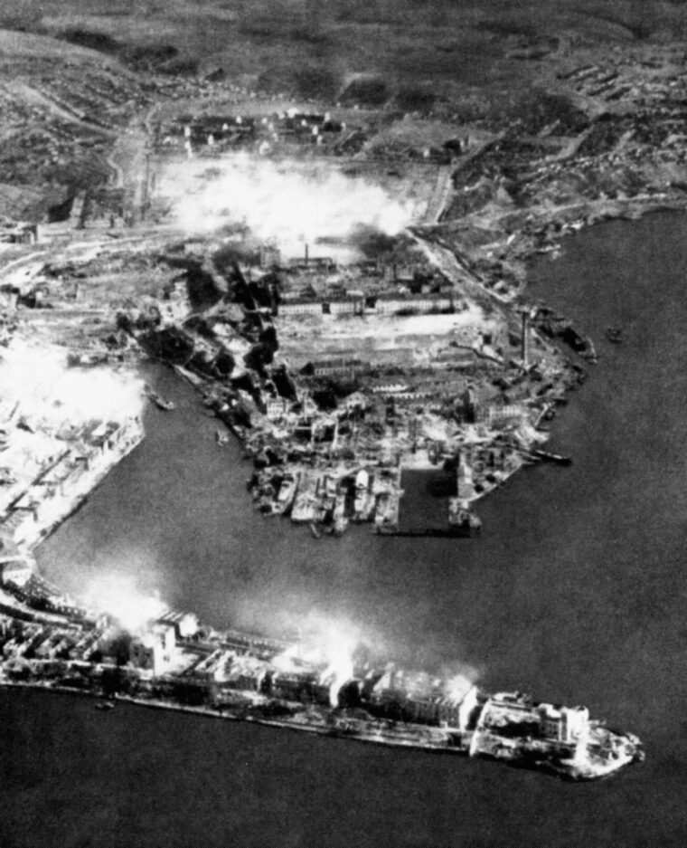 In an aerial shot of the city, plumes of smoke and clouds of rock rise above Sevastopol during the German bombardment.