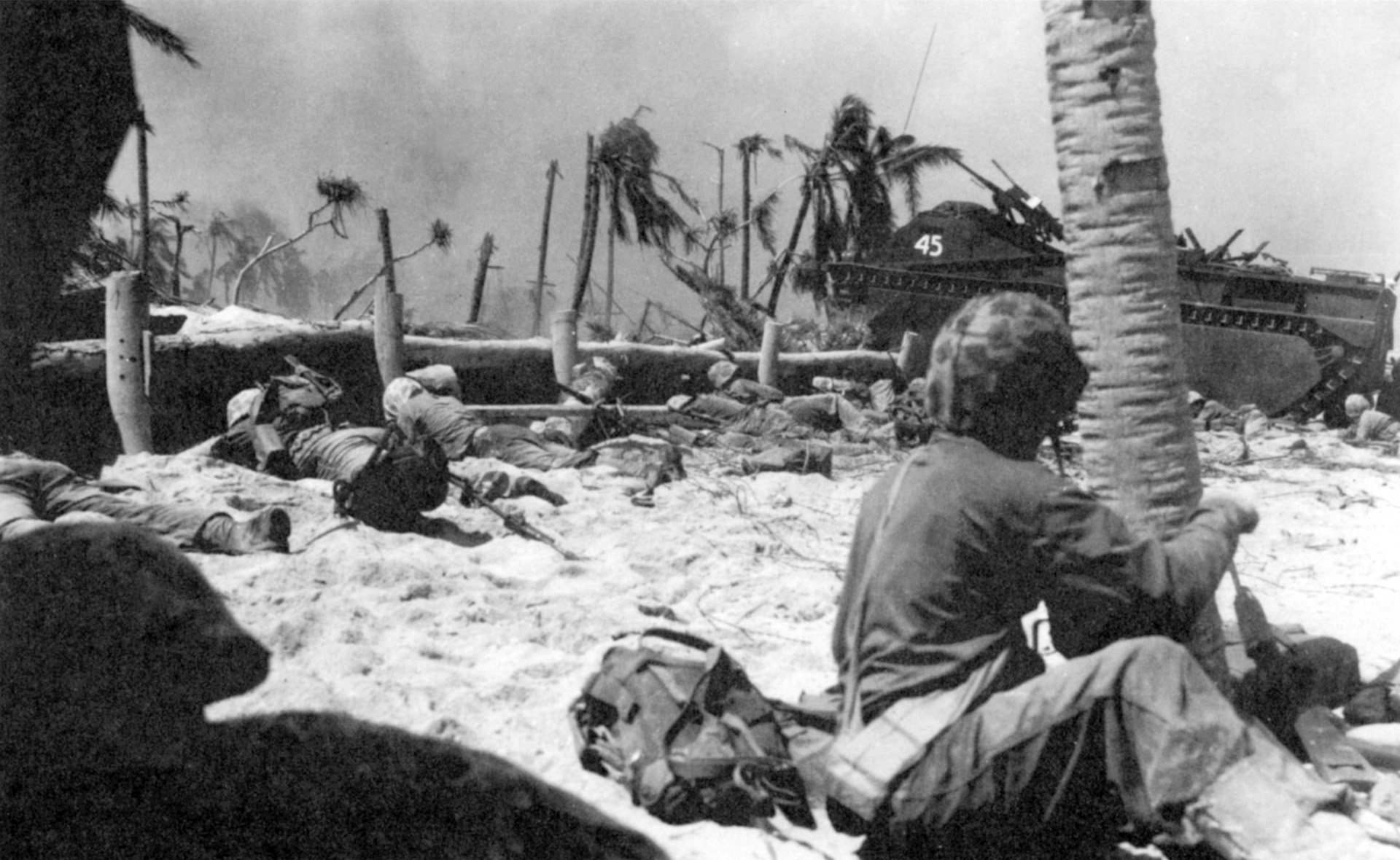  The Japanese defenders of Tarawa had constructed a labyrinth of pillboxes, blockhouses, and machine gun nests with interlocking fire. Here, moments after landing, members of E Company, 8th Marines find themselves under withering fire.