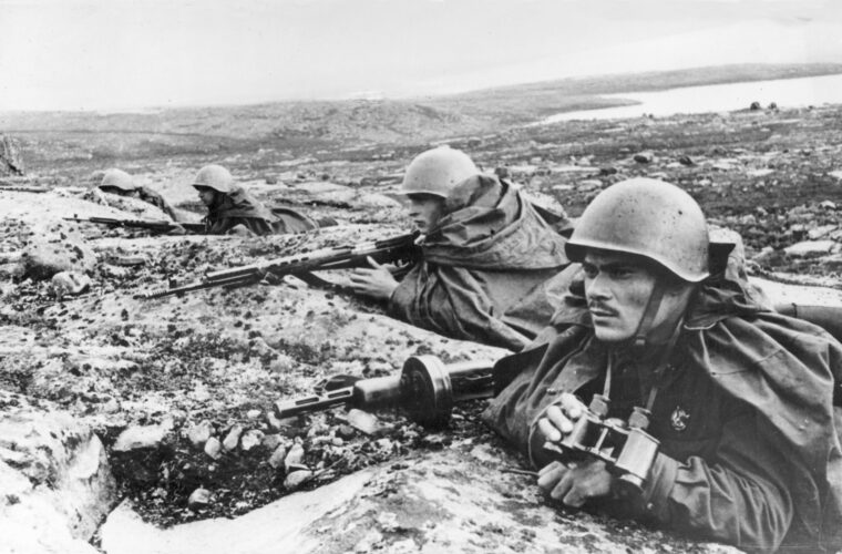 Soviet marines, their faces grim with determination, man a trench on the forward edge of their defensive positions near Novorossiysk. Attached to the Northern Fleet, these men were part of an operation to retake the strategically vital Black Sea port from the Germans.