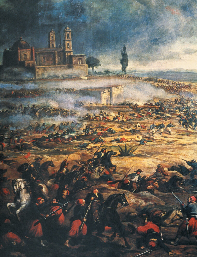 Masses of dead lie strewn about the battlefield at Puebla as Mexican lancers attack red-pantalooned Zoaves.