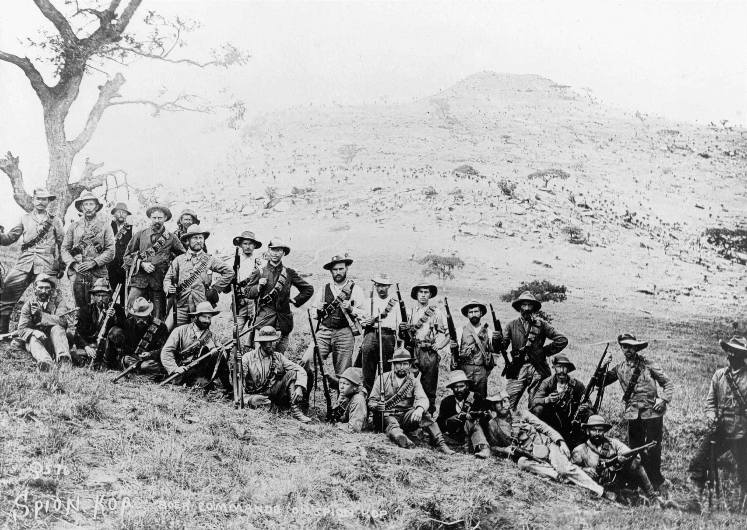 A Boer commando unit poses for a photo in front of Spion Kop. Aside from being skilled fighters, they also had an intimate knowledge of the South African terrain.