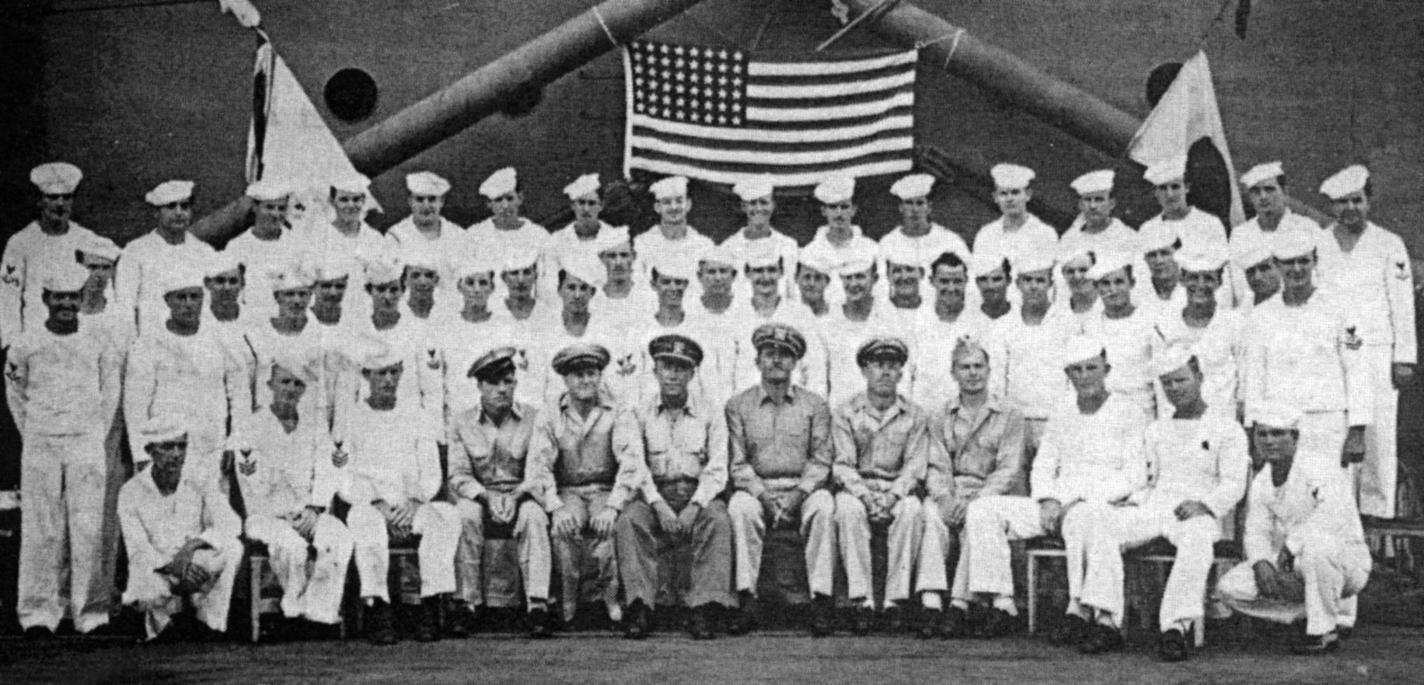 During a quiet period, the crew of the USS Goodhue poses for a portrait. Twenty-one crewmen were killed in action and more than 100 wounded off Okinawa. (Both photos: National Archives)