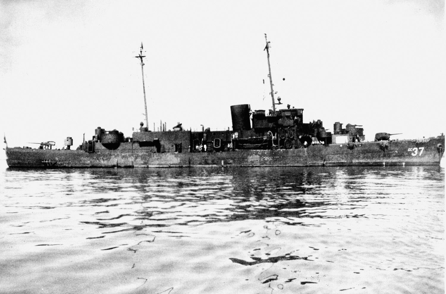 A grime covered Taney as she appeared during the Okinawa campaign. Note the beefed-up superstructure and modified armament configuration necessary to accommodate additional living and working space for the crew. 