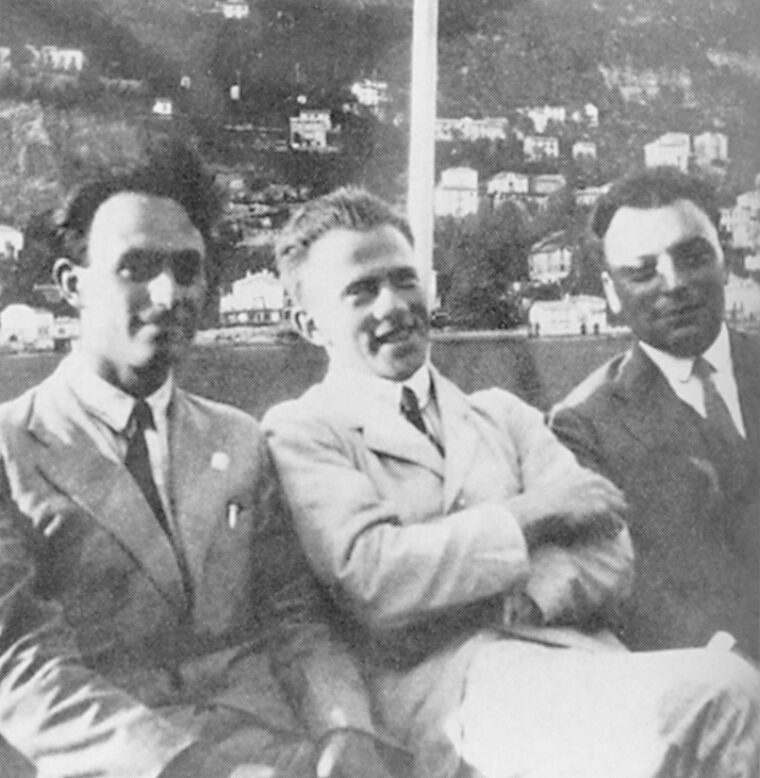 Scientists Enrico Fermi, Werner Heisenberg, and Wolfgang Pauli enjoy a discussion at Como, Italy, in 1927. Heisenberg became the leader of the Nazi atomic program.