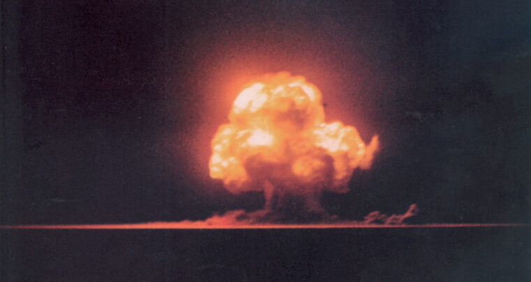At Alamogordo, New Mexico, the first atomic explosion sends a billowing mushroom cloud skyward on August 16, 1945.