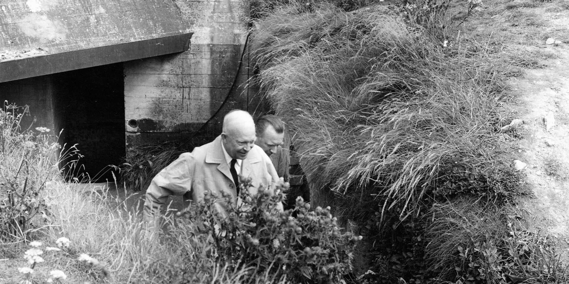 Cronkite and General Eisenhower tour German bunkers in Normandy after the war.