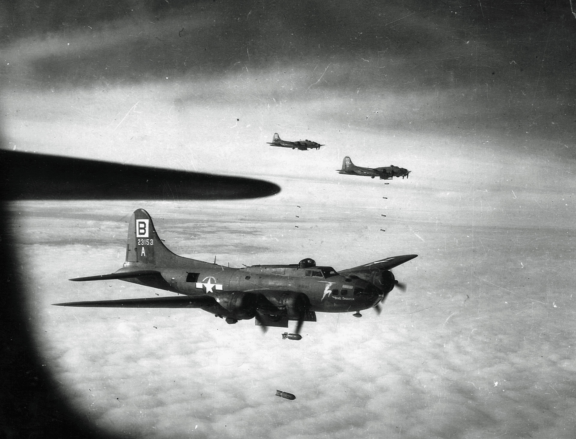 B-17’s open their bomb-bay doors and release their payload over Wilhelmshaven. Walter Cronkite and other war correspondents of the day not only rode on board, but would also man the guns if necessary. 