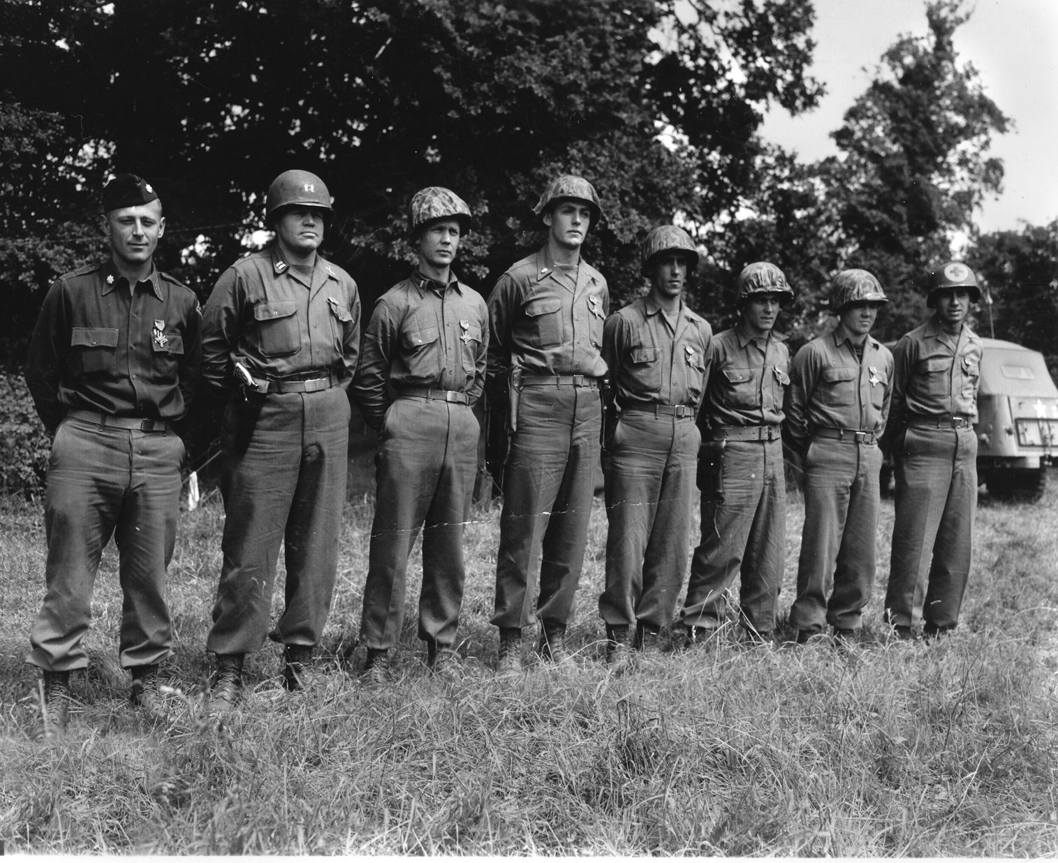 Ten Army Rangers received the Distinguished Service Cross for gallantry during the seizure of Pointe du Hoc on D-Day. Eight of the recipients are pictured here, including Lieutenant Colonel James E. Rudder, commander of the 2nd Ranger Battalion, standing at far left.